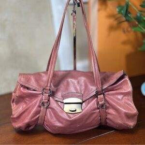 AUTHENTIC Leather Foldover Pushlock
Satchel handbag/purse.Purple /dark pink.